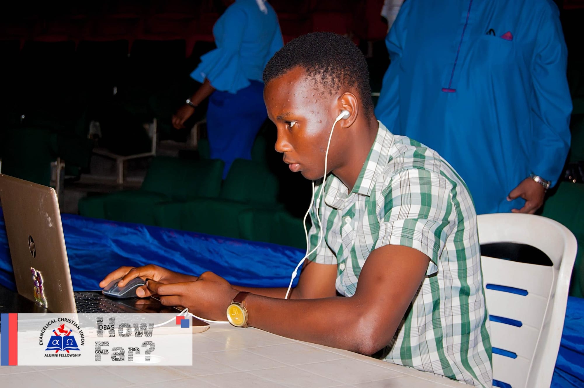 Israel Adetunji using his laptop in OAU